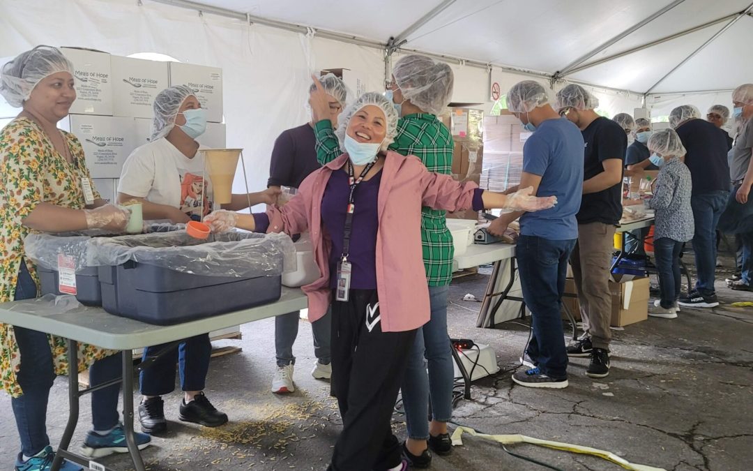 Medtronic and Meals of Hope Hold Meal Packing Marathon!